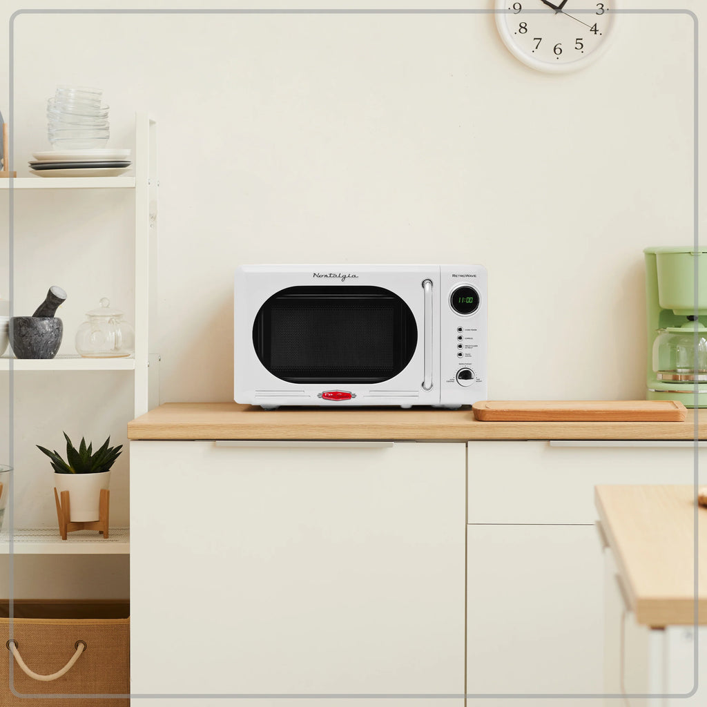 0.7 Cubic Foot 700-Watt White Countertop Microwave Oven H83064